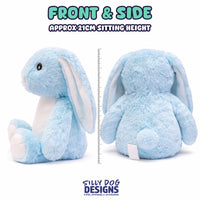 A light blue plush bunny shown from the front and back on a white background, with text reading 'FRONT & SIDE' and 'APPROX 21CM SITTING HEIGHT' plus a ruler for scale. The brand 'SILLY DOG DESIGNS' appears at the bottom.
